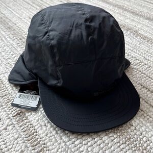 Topo designs puffer cap black one size fits most. NWT!!! Unisex hat ear flaps